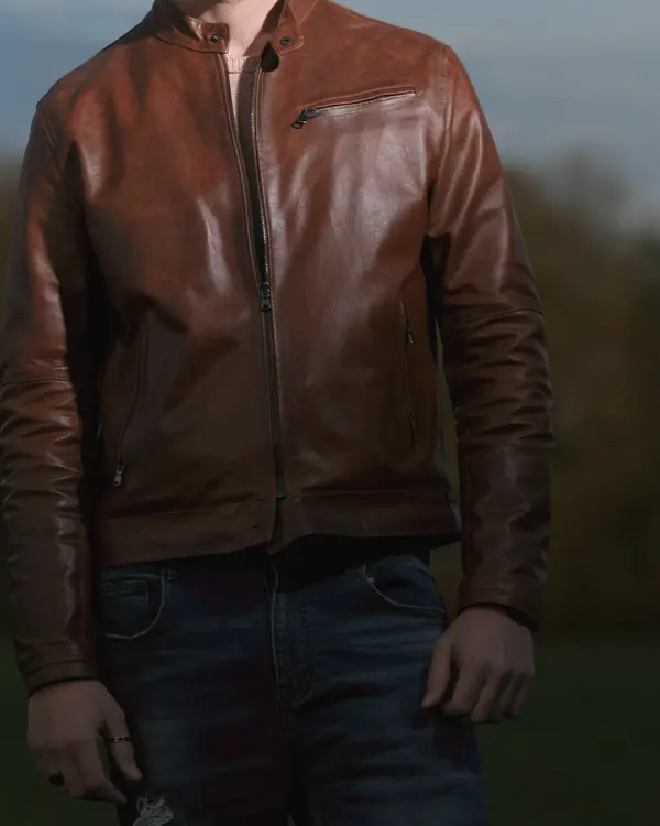 Cognac leather jacket with a band collar and a zipped chest pocket